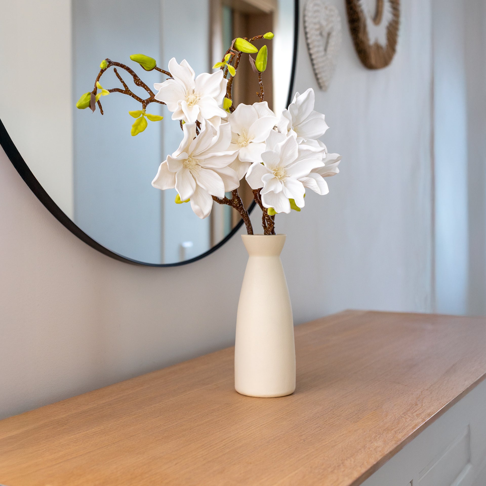Magnolia Branch with White Blossoms